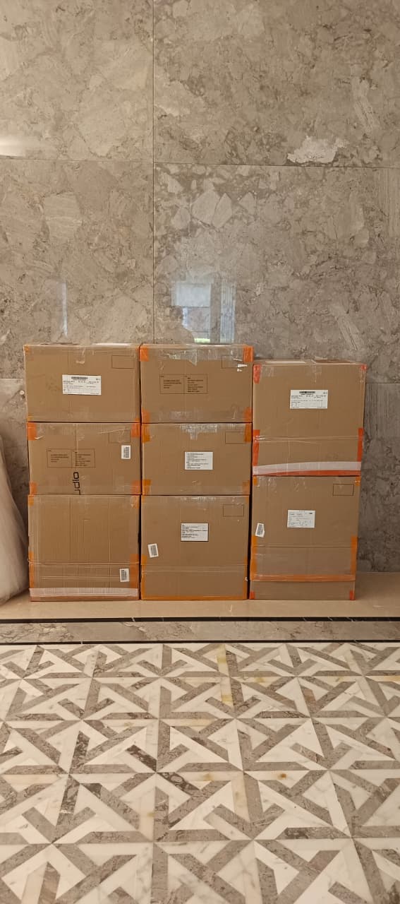 Sealed and labelled cartons ready for office shifting in Mulund