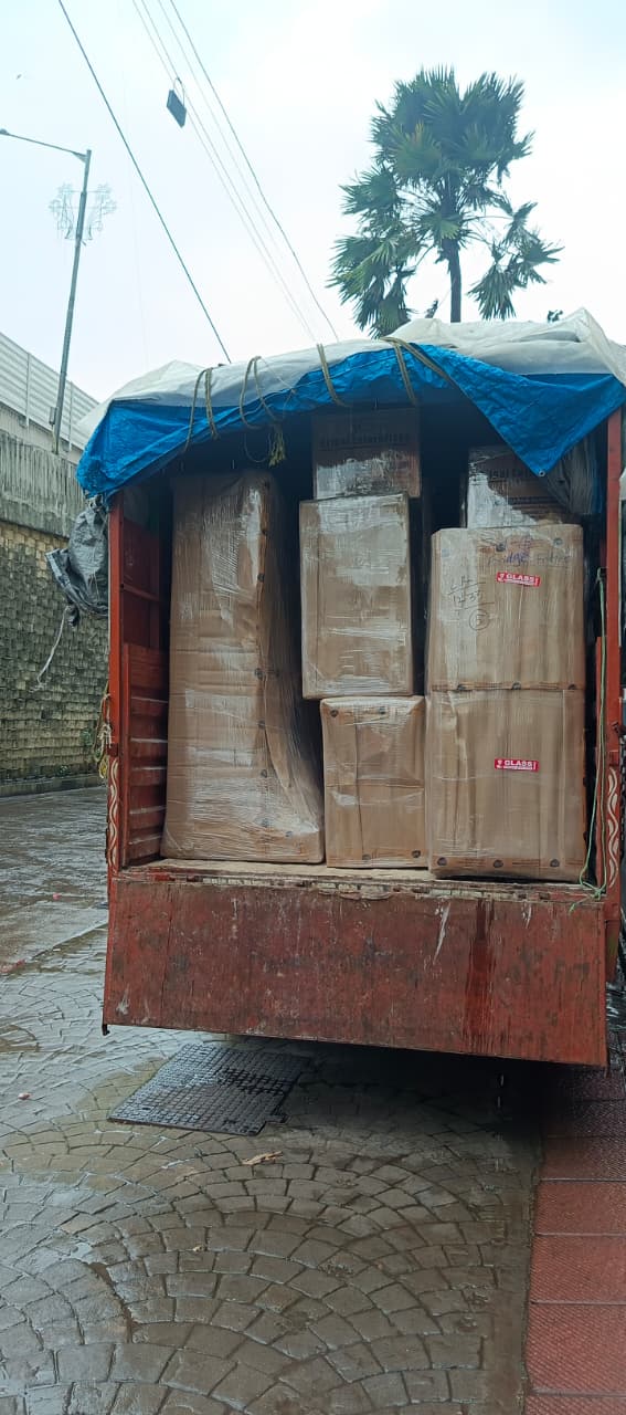 Truck loaded with packed household goods for shifting in Mulund