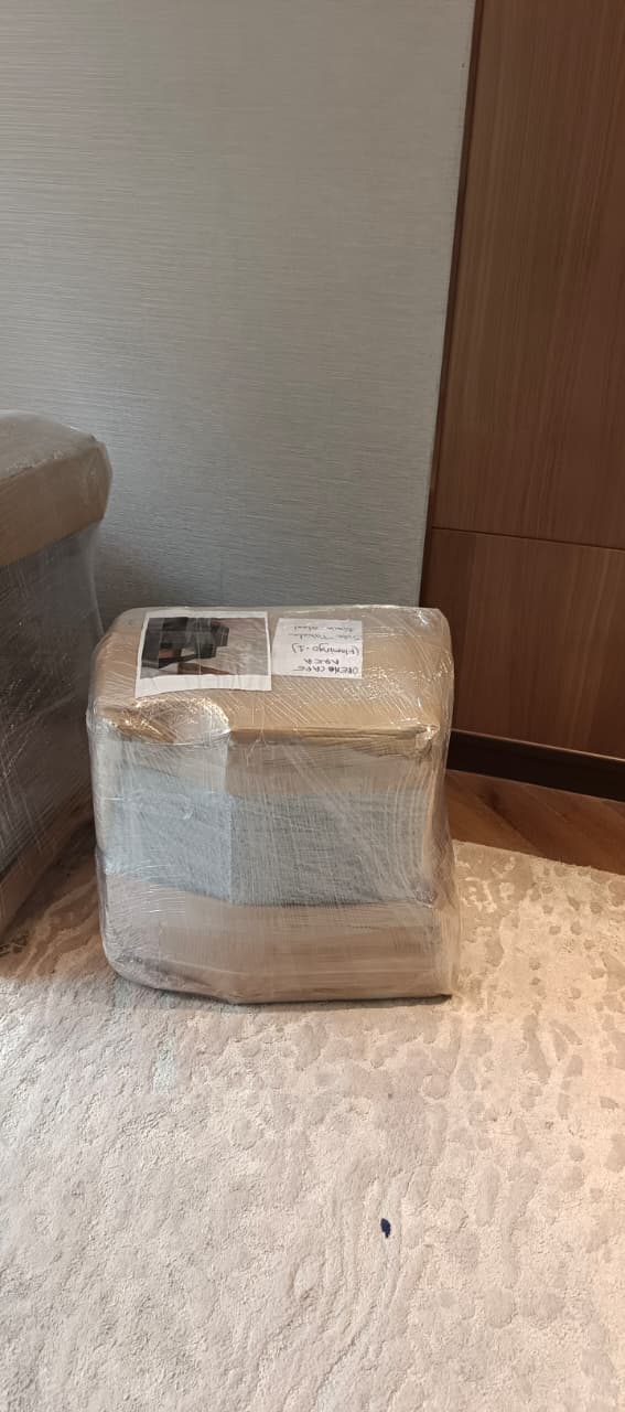 Small furniture wrapped and labelled for shifting